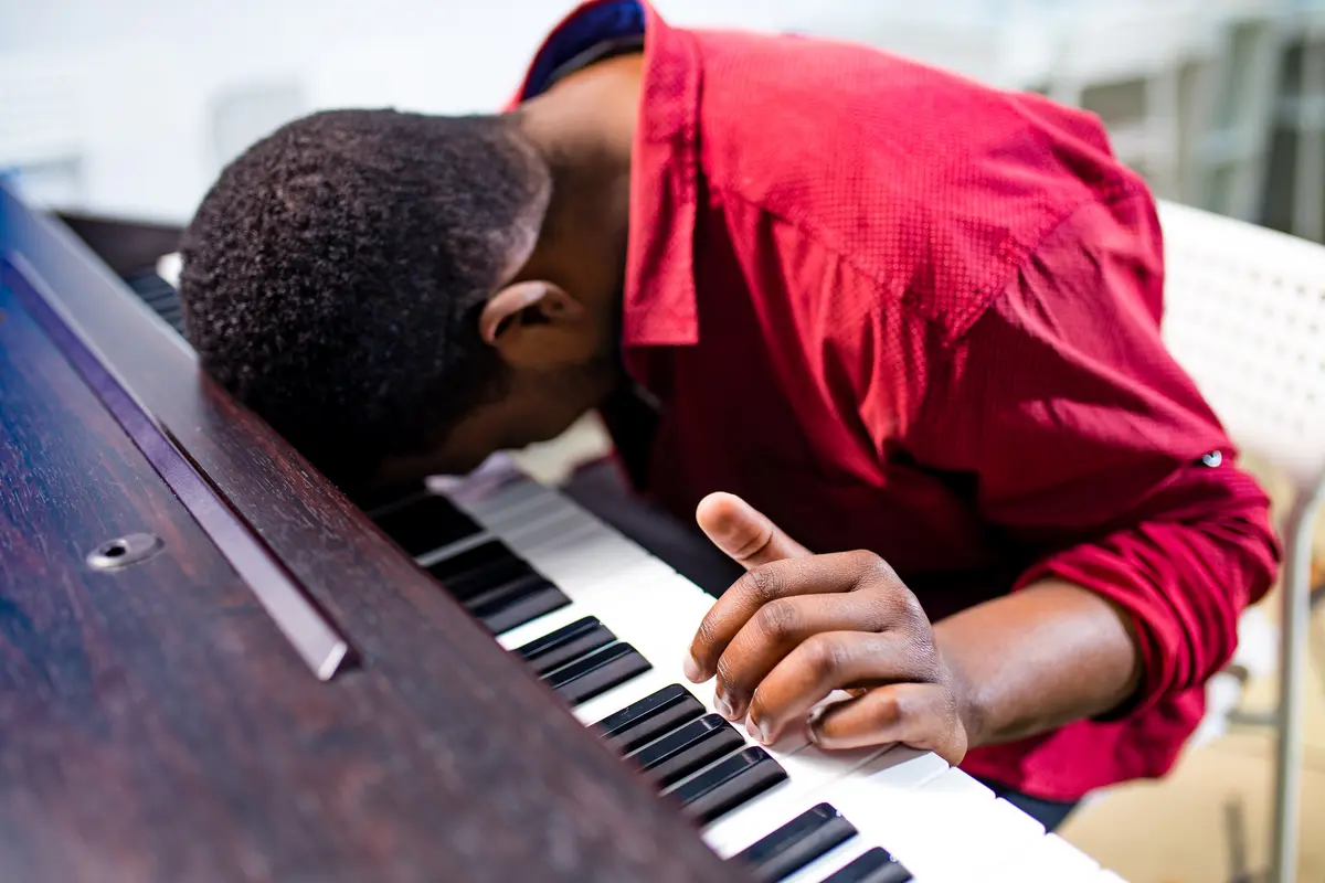 frustrated man blog post fastest way to learn a piano piece